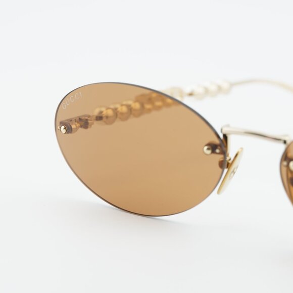 Gucci GG1922S 003 Sunglasses Endura Gold with Pearl Oval Frame, Brown Lenses main image 4